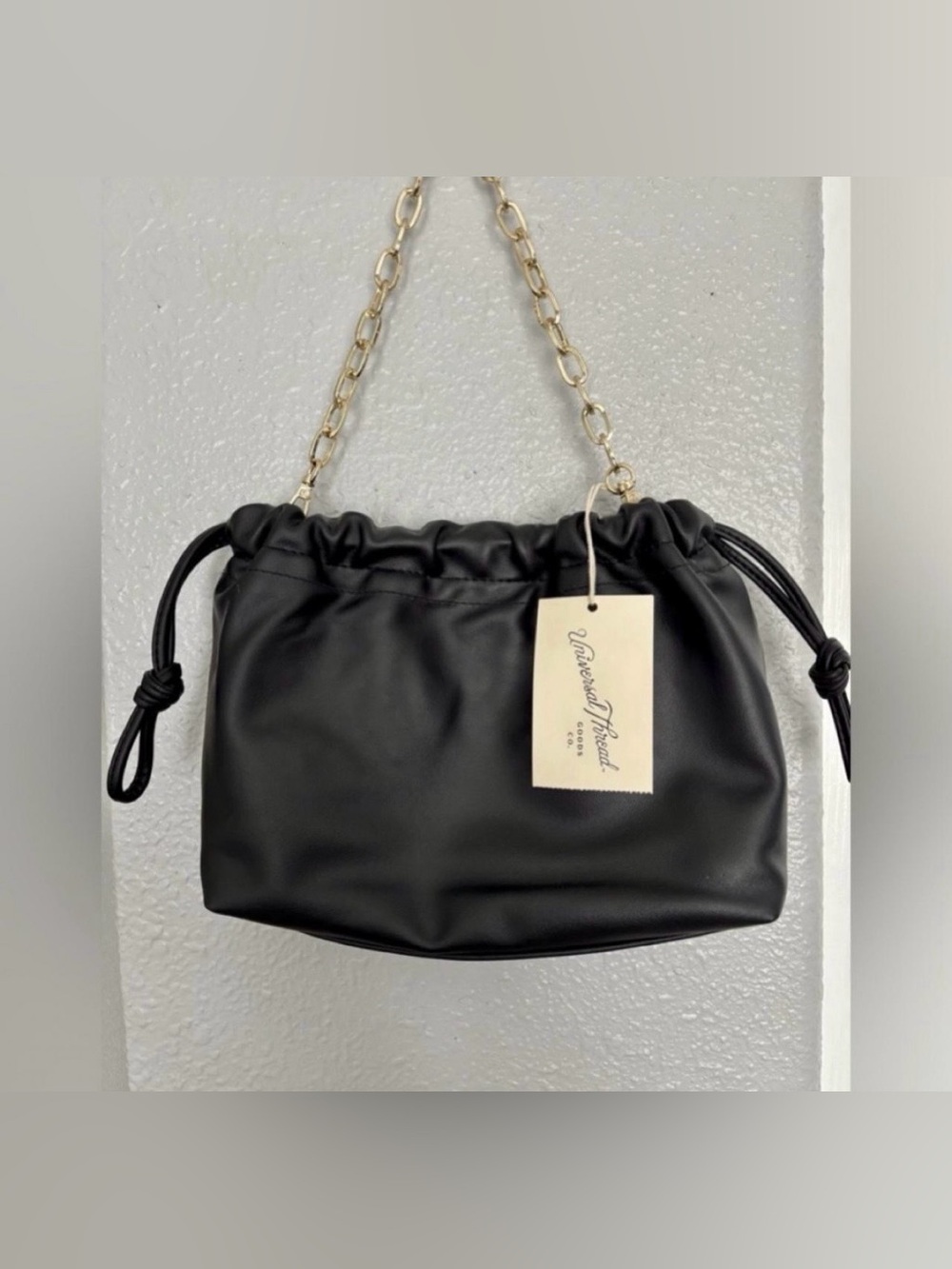 Black Drawstring Shoulder Bag with Gold Chain Handle